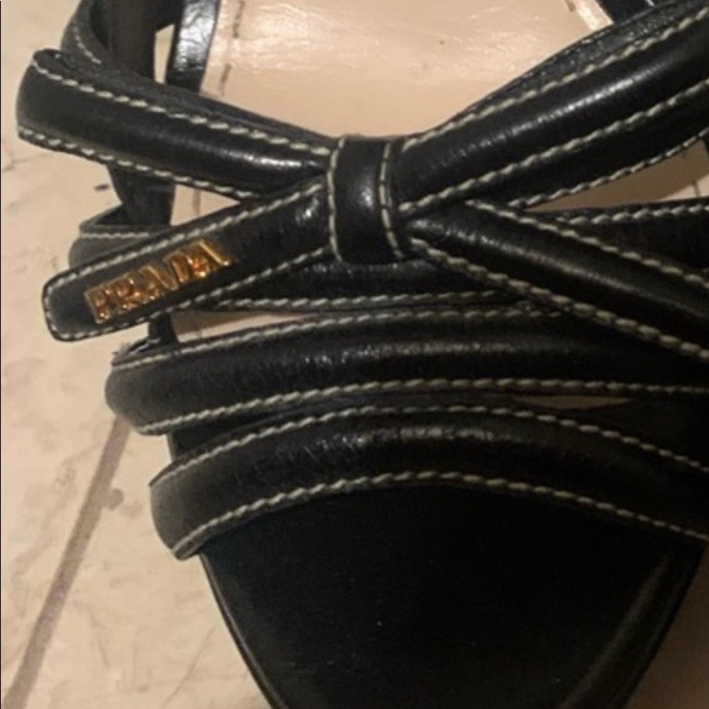 Prada black platform heels.  Prada Logo on the front. Worn a couple of times.